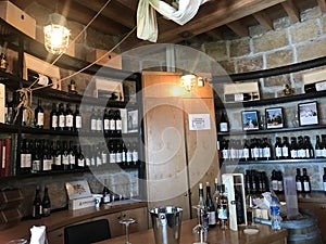 The inside view of Montefiore Windmill with wines and lights in Jerusalem , Israel