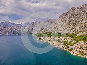 Montenegro. Boka Kotor Gulf. View on the picturesque coastal town of Dobrota, the Institute of Marine Biology and the