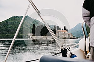 Montenegro. Perast. 16.05.2020 Boka island Church of Our Lady of the Rocks Kotor Bay. View from the boat