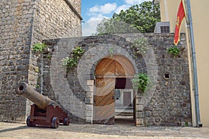 Montenegro, Tivat city. Medieval summer house of the Buca family.  Entrance door photo