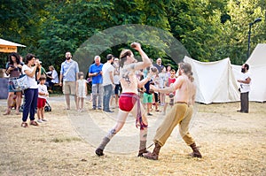 Monterenzio, Italy two fighters duel Celtic Festival reenactment