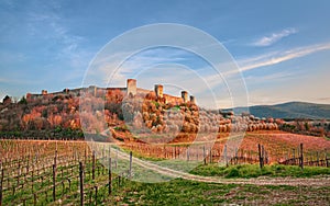 Monteriggioni, Siena, Tuscany, Italy: landscape at sunset of the ancient village along the Via Francigena photo