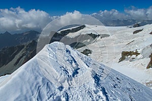 Monterosa traverse knife edge snow ridge glacier walk and climb in the Alps