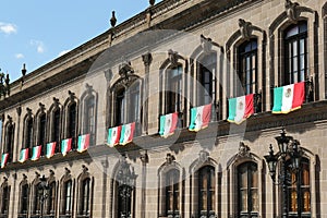 MONTERREY NUEVO LEON, MEXICO - SEPTEMBER 29, 2022: Beautiful view of Palacio de Gobierno Government Palace with flags on sunny