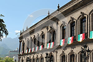 MONTERREY NUEVO LEON, MEXICO - SEPTEMBER 29, 2022: Beautiful view of Palacio de Gobierno Government Palace with flags on sunny photo