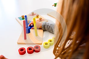 In montessori alternative education pedagogy special materials are used to guide the student to develop all their creative photo