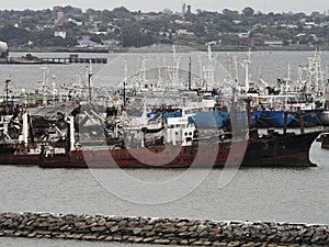 .MONTEVIDEO, URUGUAY - FEBRUARY 18, 2022: Illegal fishing boats captured in coastal waters are stranded and left to rust in the