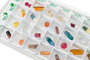 Monthly pills planner with a daily dose of medications in each cell