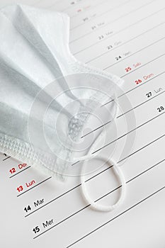 Montly calendar with medical mask