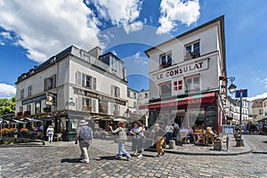 Street life in Montmartre district, Paris.