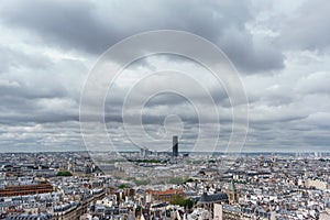 Montparnasse tower over Paris, cloudy day