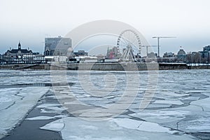 Montreal big wheel Old Port foggy scene