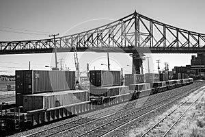 Montreal BW port scene with trains containers and bridge