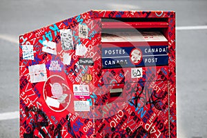 A bright red Canada Post mailbox