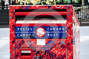 A bright red Canada Post mailbox