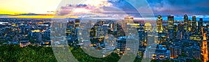 Montreal city at sunrise in the beautiful morning. Amazing view from Mont-Royal with colorful blue buildings. Stunning panorama of photo