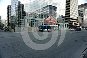 Montreal, QC, Canada - 7-14-2021: stm bus at Sherbrooke street west after the ease of the lockdown of coronavirus and Montreal