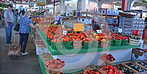 People buy groceries at Jean-Talon Market