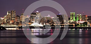 Montreal skyline and St Lawrence River at night