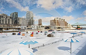 The Montreal yacht club marina fishing on ice in the Old Port