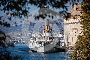 Montreux, Switzerland - October 2016: Historic paddle steamer at Chateau de Chillon on Lake Geneva