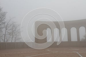 Montserrat Monastery in foggy winter photos of the exteriors photo