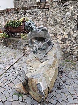 Monument of beggar in Mukachevo castle, Ukraine