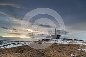 Monument Buzludzha in Balkan mountain at sunset