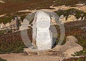 A monument on Cabo da Roca honoring founder Paul Harris on the seventy-fifth anniversary of Rotary International. photo