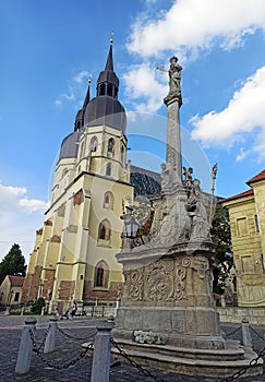 Monument and a church of saint Nicholas in centre of Trnava, Slovakia.