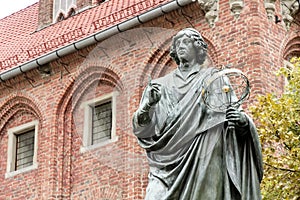 Monument of Copernicus against Town Hall in Torun.