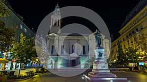 Monument of Croatian poet Petar Preradovic on Preradovic square night timelapse and Serbian orthodox church, Zagreb