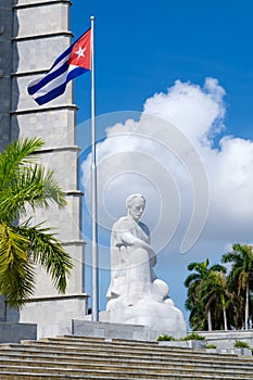 Monument and cuban flag at the Revolution Square in Havana