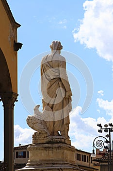 Monument of Dante Alighieri, famous italian poet in the Piazza Santa Croce ,Florence, Italy