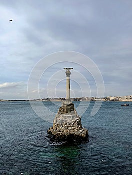 Monument of Dead war ships in water of Black sea in Sebastopol