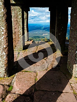 Monument on the Donon mountain peak in the Vosges. Historic sacred place where the rituals of the Celts and Proto-Celts took place photo