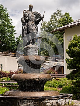 Monument in front of church in Matrei