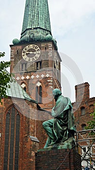 Monument of german poet and playwright Emanuel von Geibel, near Saint James church, Lubeck, Germany photo