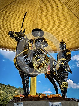 Monument of king Taksin and his bodyguard photo