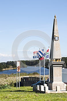 Monument near dutch sluice Dokkumer Nieuwe Zijlen