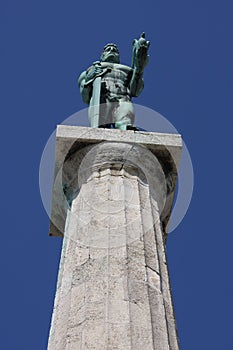 Monument sculpture of the Belgrade Victor made of bronze, located in Kalemegdan park facing the Sava River and Zemun district, Bel