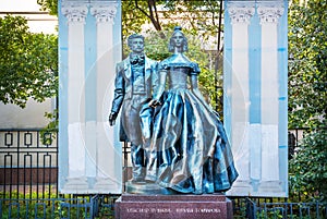 Monument to Alexander Pushkin and Natalia Goncharova on the Arbat in Moscow photo