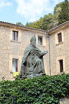 Monument to Bishop Pere-Joan Campins. An amazing catholic monastery on the island of Mallorca Santuari de Lluc. photo