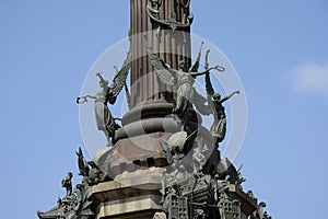 Monument to Columbus in Barcelona.Columbus points toward the sea.The cast-iron monumental column on which Columbus stands is