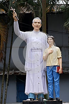 Monument to Croatian Jesuit Missionary Ante Gabric in front of the Catholic Church in Kumrokhali, India