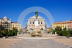 Monument to Felipe IV on Eastern square (Plaza de Oriente) and Royal theatre (Teatro Real), Madrid, Spain photo