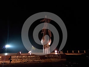 Monument to the founders of Kiev with illumination at night.