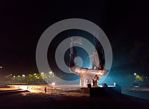 Monument to the founders of Kiev with illumination at night.