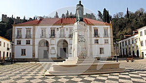 Monument to Gualdim Pais, founder of the town, Town Hall building in background, Tomar, Portugal