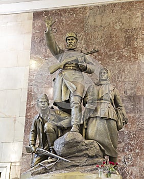 Monument to the heroes guerrillas in Moscow metro station Partizanskaya, Russia.